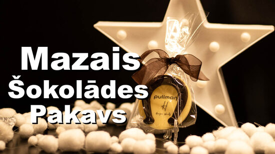 Шоколадная «Подкова счастья» в пакетике с лентой.