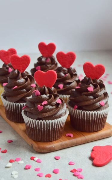 Cupcakes with red chocolate hearts