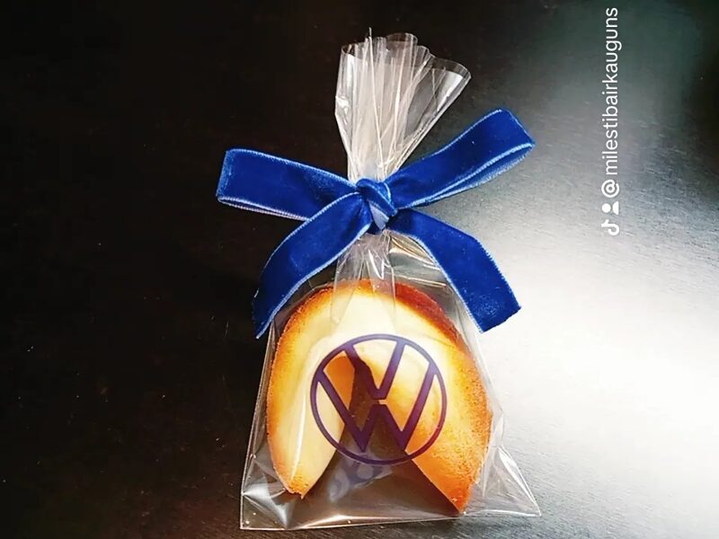 Fortune cookies in bags with ribbons with stickers on the bag