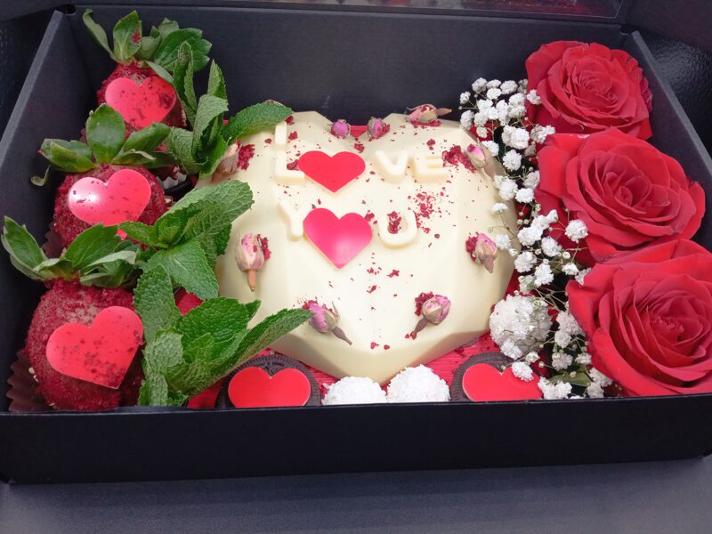 Chocolate 3D heart with inscription, strawberries in chocolate, roses, sweets