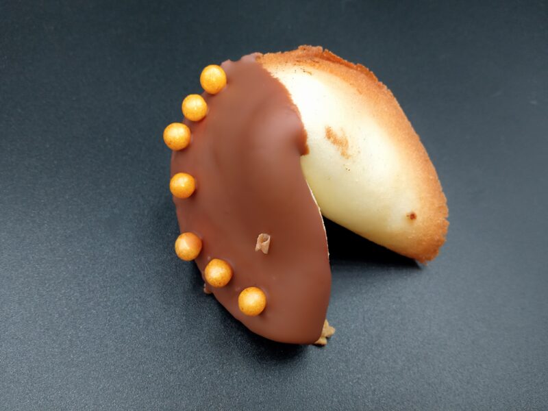 Fortune Cookie with Milk Chocolate and Golden Sugar Decorations