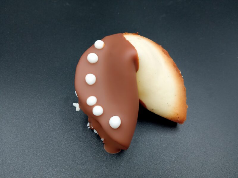 Fortune Cookie with Milk Chocolate and White Sugar Decorations